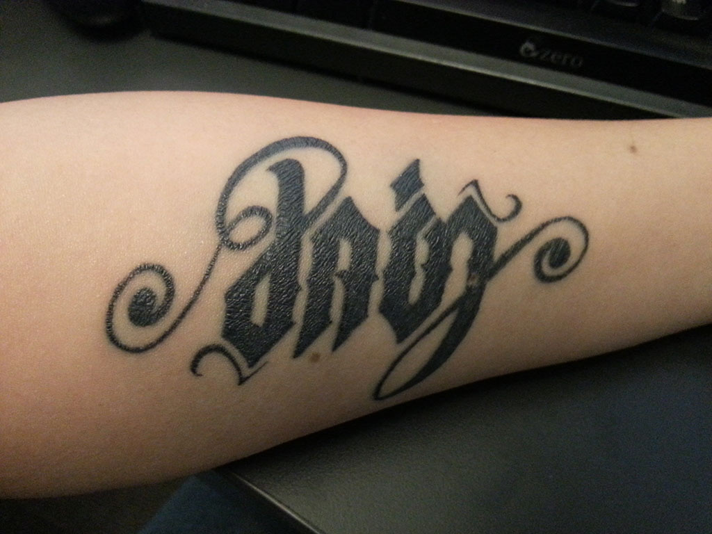 Love Pain Ambigram Tattoos: A Unique Expression Of Complex Emotions