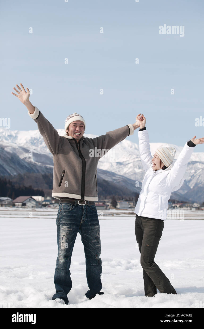 Romantic Couple Photoshoot: Capturing Love Over Snowy Landscapes